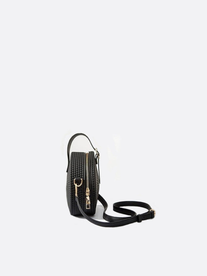 Bolso redondo de piel<br>Amira