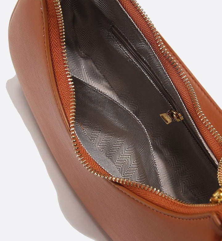 Bolso bandolera de piel media luna<br>Oraya