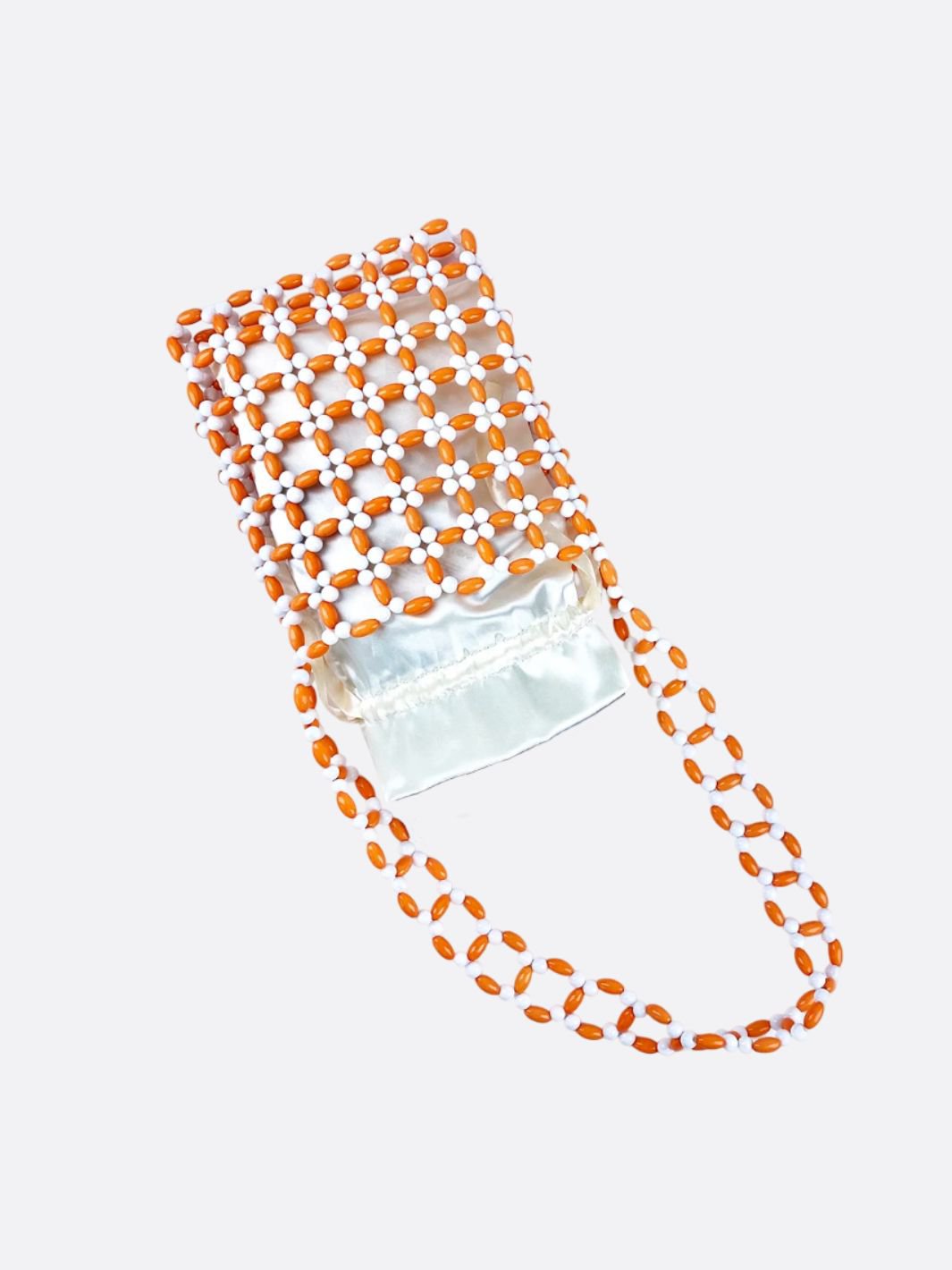Bolso de mano con perlas